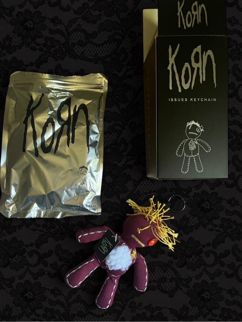 Korn Issues Maroon and Yellow Blindbox Doll Keychain With Packaging